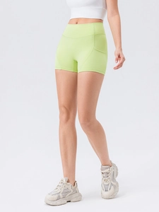 Women's high waist yoga shorts in neon green with side pocket for running and fitness
