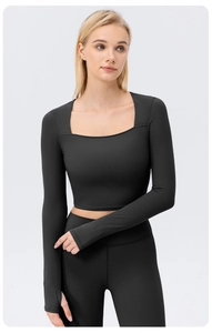Detail of black square neck long sleeve crop top with thumbholes for yoga and fitness
