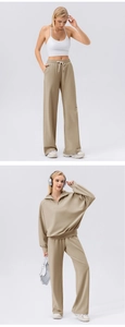 Detailed view of high waist khaki wide leg sweatpants with drawstring and soft cotton fabric