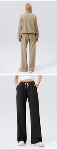Detail view of khaki tracksuit set and black wide-leg joggers with drawstring waist