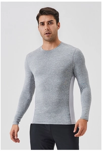 Close-up of gray long sleeve compression shirt with breathable side mesh panels