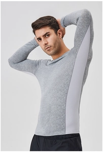 Detail view of breathable side mesh and elastic fabric on men's quick-dry sports t-shirt