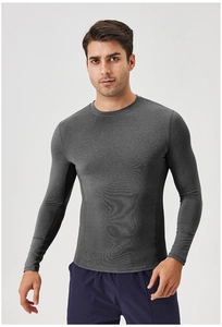 Close-up of moisture-wicking compression shirt seams for men's athletic training