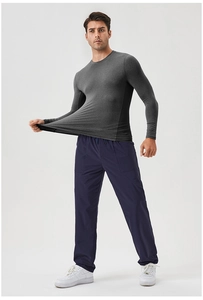 Men's high-elastic compression shirt showing great stretchability for fitness and running