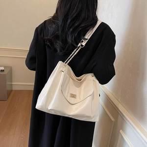 Chic cream white oversized PU leather tote bag with gold chain strap for women