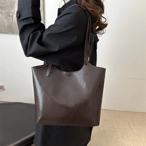 Retro deep brown oil-wax leather large tote bag for women showing a classic shoulder style