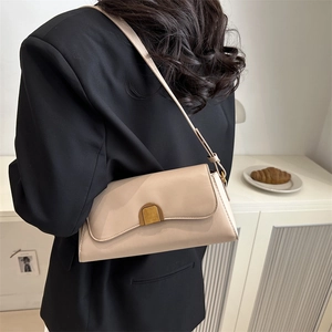 French retro beige leather baguette shoulder bag with gold metal buckle for women