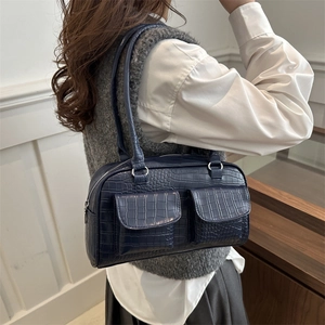 Dark blue crocodile texture shoulder bag with front pockets and silver zipper detail