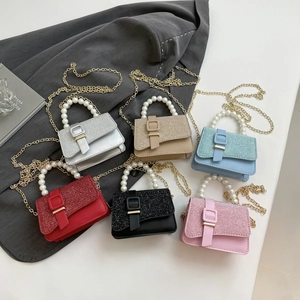 Mini pearl handle crossbody bag in multiple colors with glitter flap and chain strap