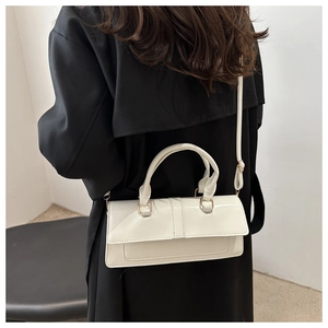 Chic cream white rectangular crossbody bag with glossy leather and gold buckle strap