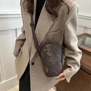 Retro brown PU leather crossbody bag with vintage letter print and adjustable strap