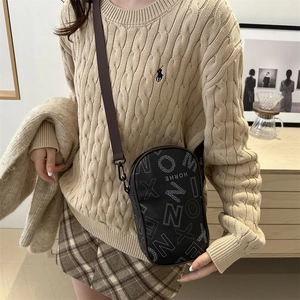 Fashionable black PU leather crossbody bag with vintage letter print and brown strap