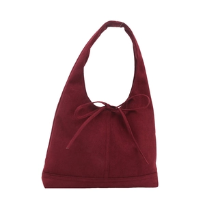Minimalist burgundy suede hobo tote bag with elegant front bow tie detail