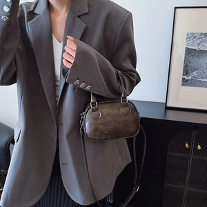 Retro dark brown leather bowling bag for women with embossed letters and shoulder strap