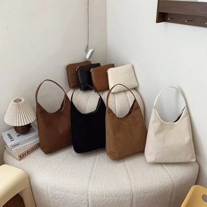 Minimalist faux suede half-moon tote bag set in brown, black, tan, and beige colors