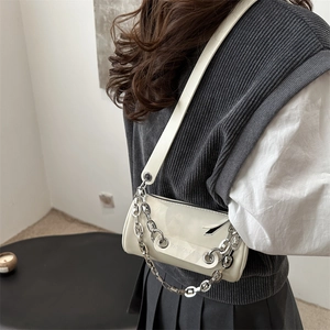 Retro cream cylinder shoulder bag with metal chain strap and sleek glossy finish