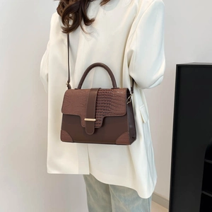 Vintage brown crossbody bag with top handle and crocodile texture, 2025 fashion style