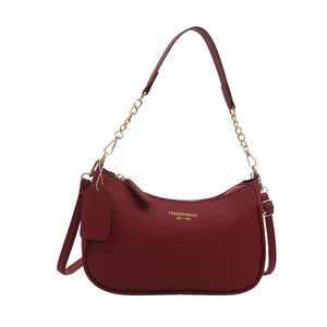 Minimalist red leather hobo bag with gold chain strap and textured finish for women