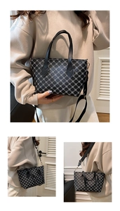 Detail of black tote bag with white floral pattern and adjustable nylon wide strap