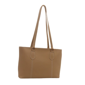 Minimalist camel tote bag with contrast stitching and long handles in a frontal view