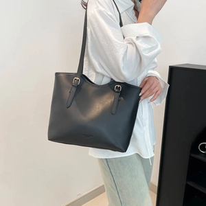 Classic black PU leather tote bag with long straps and gold hardware for daily commute