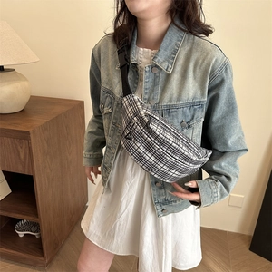 Classic black and white checkered canvas waist bag with adjustable strap and metal zipper