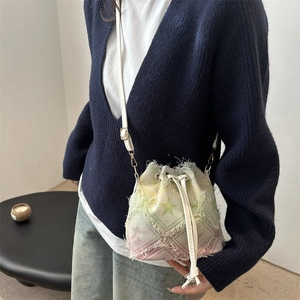 Mini checkered star bucket bag with colorful gradient fringe and white leather shoulder strap