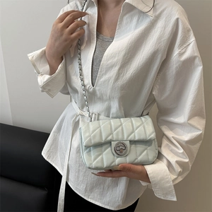 Chic mint blue quilted crossbody bag with metal chain strap and twist-lock closure