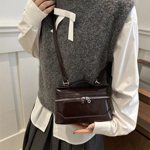 Vintage dark brown patent leather crossbody box bag with silver hardware and top handle