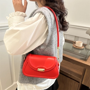 Elegant red shoulder bag with gold hardware buckle and chain strap for women
