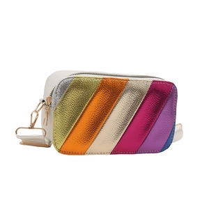 Rainbow striped camera crossbody bag with colorful faux leather panels and gold zipper