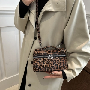 Vintage leopard print box handbag with dual zippers and adjustable shoulder strap