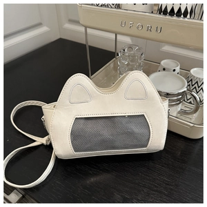 Detail of white cat-eared crossbody bag featuring a transparent mesh window display