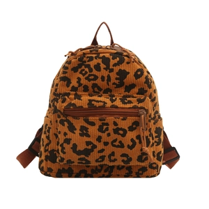 Corduroy backpack with leopard print design featuring adjustable straps and front pocket