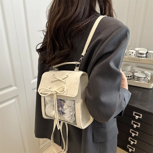 Japanese style cream ita-bag featuring transparent window and ribbon lace-up details