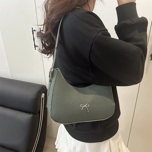 French vintage green woven hobo bag with silver metal bow and adjustable shoulder strap