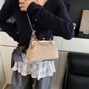 Vintage beige woven shell-shaped crossbody bag with gold chain strap for women