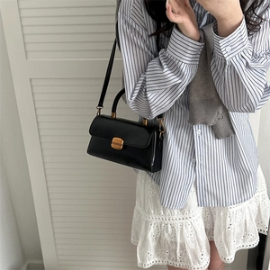 Classic black leather square crossbody bag with gold metal handle and lock buckle