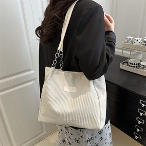 Minimalist beige corduroy tote bag with chain strap, stylish large capacity shoulder bag