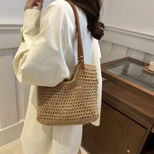 Summer woven tote bag with brown leather straps and hollow design for women