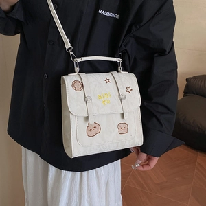 White vintage-style square crossbody bag with cartoon bear embroidery and strap