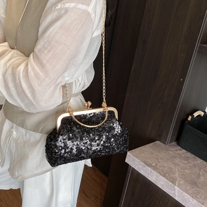 Elegant black sequin evening clutch bag with gold kiss-lock clasp and chain strap