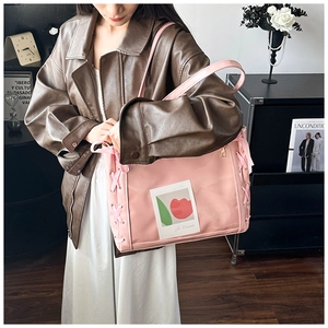 Detail of pink ribbon tote bag with transparent pocket and romantic tulip card insert