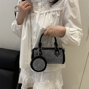 Chic black cylinder rhinestone handbag with chain strap and matching coin purse