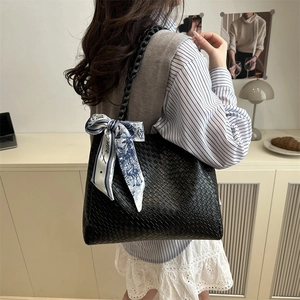 Woven black tote bag with decorative France floral scarf for stylish women commuting