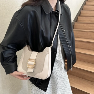 Chic beige patchwork canvas and leather crossbody bag with golden buckle for women