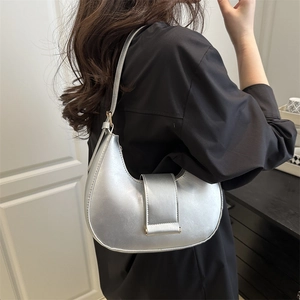 Silver metallic crescent hobo bag with adjustable shoulder strap for women