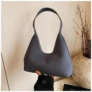 Detailed blue woven hobo bag with Fashion logo print and textured half-moon structure