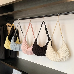 Puffy crescent crossbody bags in five colors with bubble texture and adjustable straps