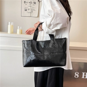 Chic black crocodile embossed tote bag for women with shiny patent leather finish